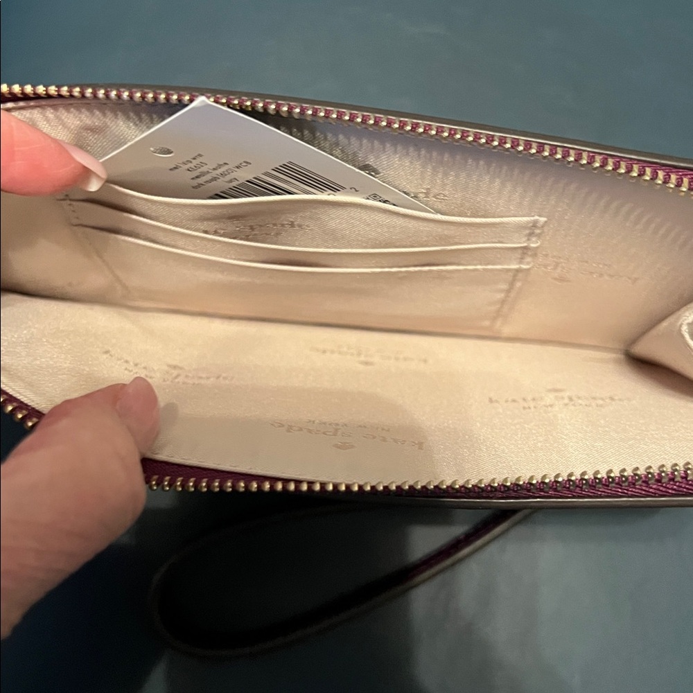 NWT, KATE SPADE LUCY MED. L ZIP METALLIC LEATHER WRISTLET, DARK RASPBERRY - Picture 6 of 7